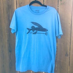 Men’s L Patagonia light blue T-shirt. Fish and spear decal.